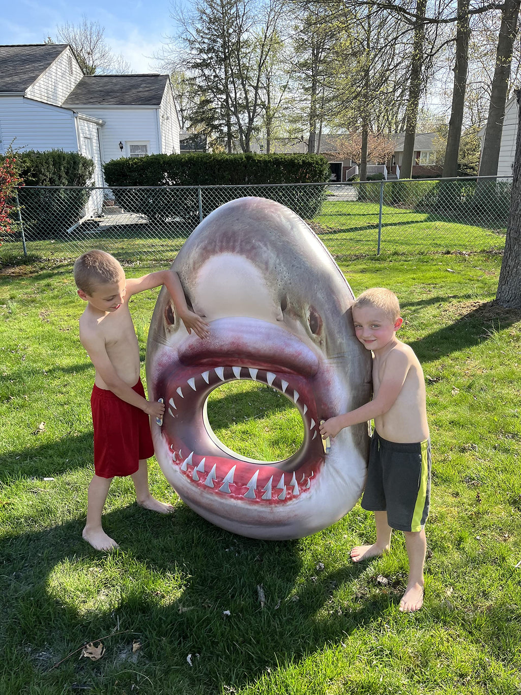 Jumbo Inflatable Shark Head Pool Float! This Cool and Funny Pool Float with Lifelike Features is Perfect for Pool Parties, Birthday Parties,Beach Parties or just a Floating Pool Lounge!