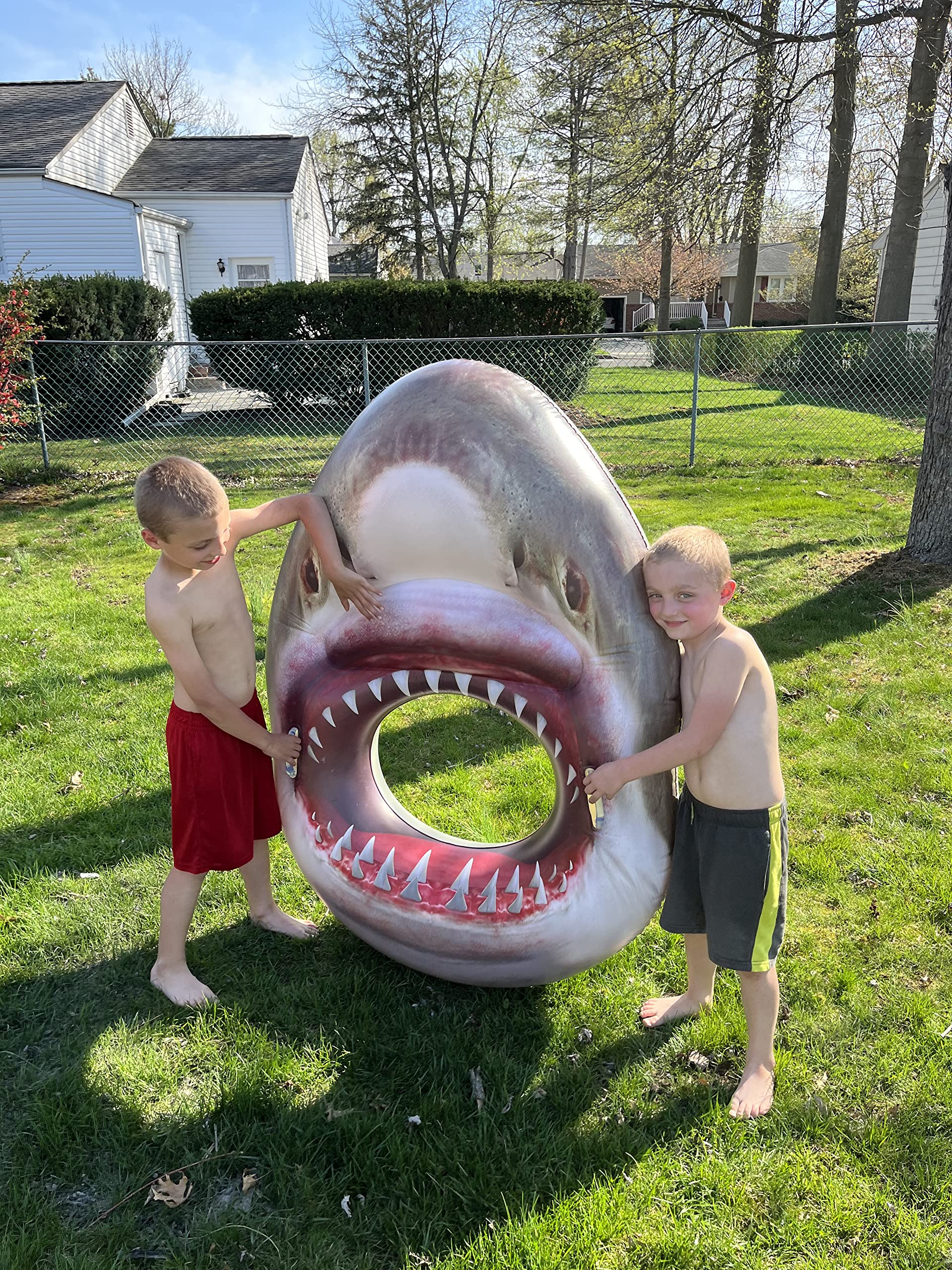 Jumbo Inflatable Shark Head Pool Float! This Cool and Funny Pool Float with Lifelike Features is Perfect for Pool Parties, Birthday Parties,Beach Parties or just a Floating Pool Lounge!